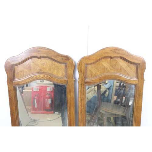 549 - Pair of large oak surround mirrors, H 118cm