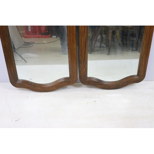 549 - Pair of large oak surround mirrors, H 118cm