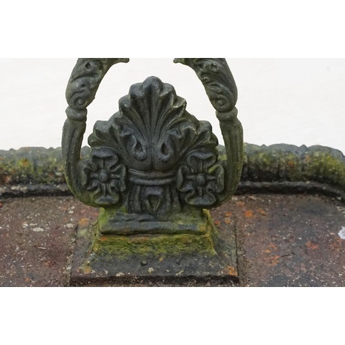 574 - Late 19th century cast iron eight division umbrella / stick stand with drip tray, 68cm high x 46.5cm... 