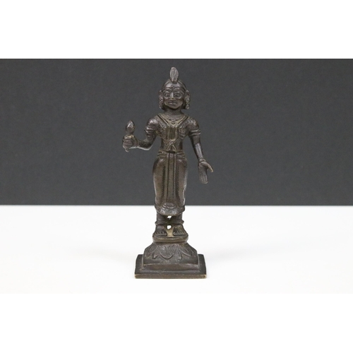 161 - Bronze figure of a deity, probably Parvati stood on a lotus leaf, 13cm high