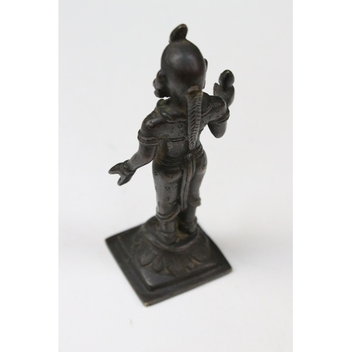 161 - Bronze figure of a deity, probably Parvati stood on a lotus leaf, 13cm high