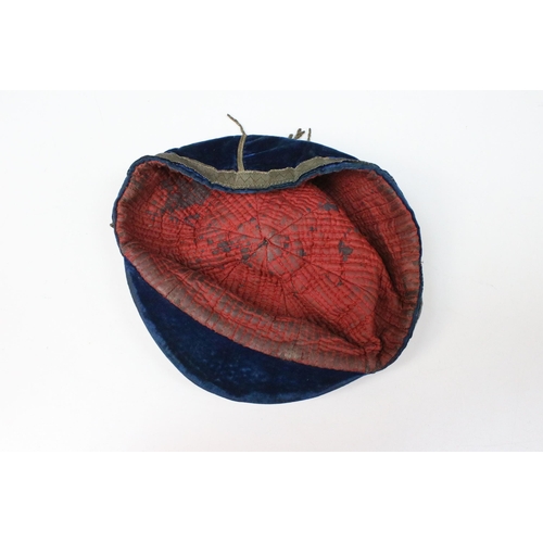 207 - Rugby / football - 1909 navy velvet cap, with gilt tassel, gilt embroidered with a dragon and dated ... 