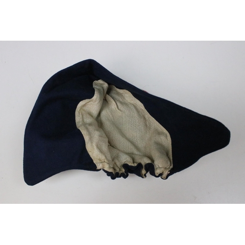 207 - Rugby / football - 1909 navy velvet cap, with gilt tassel, gilt embroidered with a dragon and dated ... 