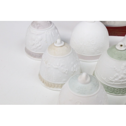 41 - Fourteen Lladro bells, to include two boxed examples, 1999 Christmas Bell and 2000 Christmas bell (1... 