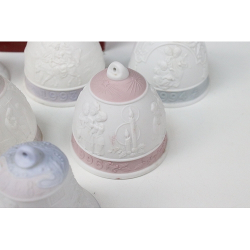 41 - Fourteen Lladro bells, to include two boxed examples, 1999 Christmas Bell and 2000 Christmas bell (1... 