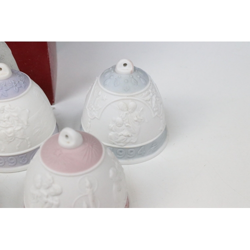 41 - Fourteen Lladro bells, to include two boxed examples, 1999 Christmas Bell and 2000 Christmas bell (1... 