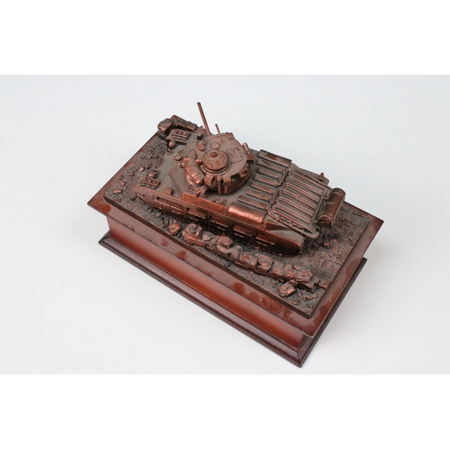 421A - Danbury Mint, Queen of the Desert resin sculpture of tank on plinth containing old and commemorative... 