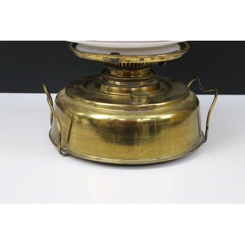 441A - Early 20th century brass English Petroleum Lamp Co, Birmingham, with hand-painted conical glass shad... 