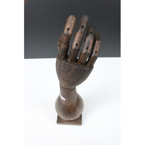 115 - Wooden articulated shop display hand, H 45cm