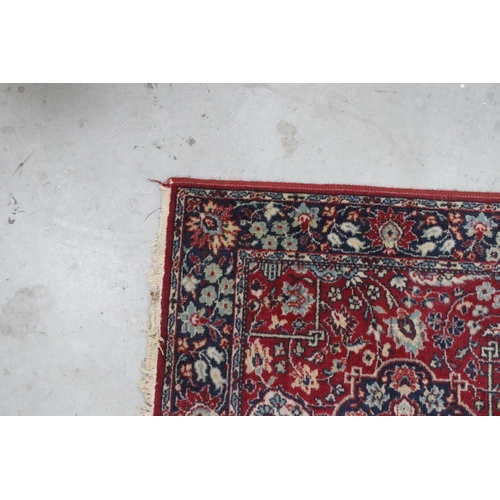 648 - Tabris Super red ground rug, with two central medallions within borders, 139 x 70cm and a red ground... 