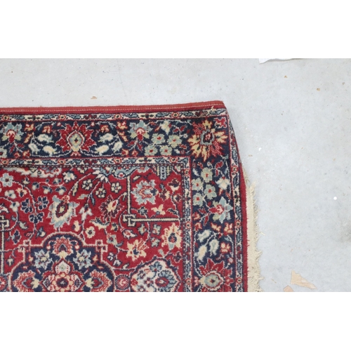 648 - Tabris Super red ground rug, with two central medallions within borders, 139 x 70cm and a red ground... 