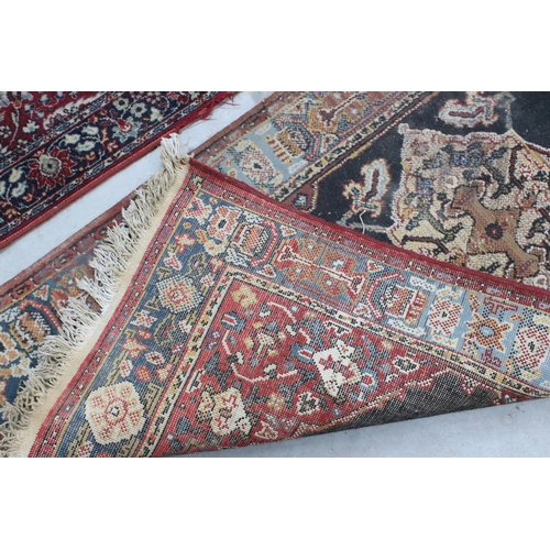 648 - Tabris Super red ground rug, with two central medallions within borders, 139 x 70cm and a red ground... 