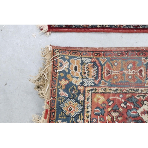 648 - Tabris Super red ground rug, with two central medallions within borders, 139 x 70cm and a red ground... 