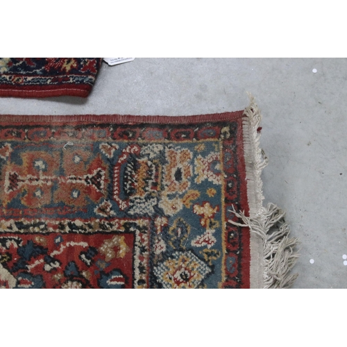 648 - Tabris Super red ground rug, with two central medallions within borders, 139 x 70cm and a red ground... 