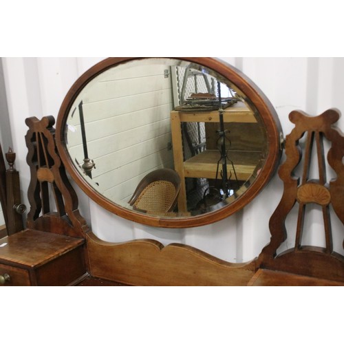 641 - Edwardian mahogany parquetry inlaid dressing table, with swivel mirrored back, the mirror with bevel... 