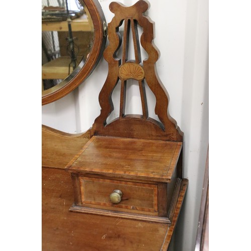 641 - Edwardian mahogany parquetry inlaid dressing table, with swivel mirrored back, the mirror with bevel... 