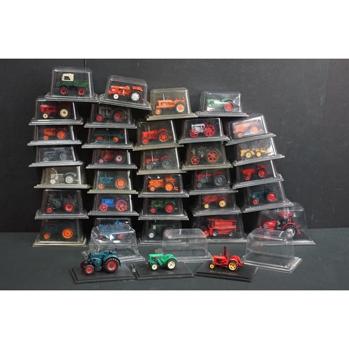 106 - 34 Boxed / cased Hatchette diecast model tractors, all variants, ex