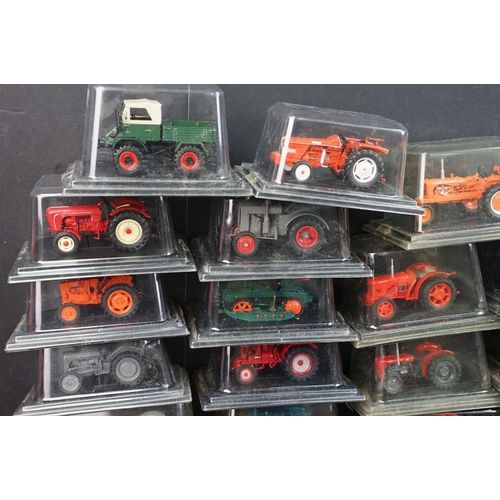 106 - 34 Boxed / cased Hatchette diecast model tractors, all variants, ex