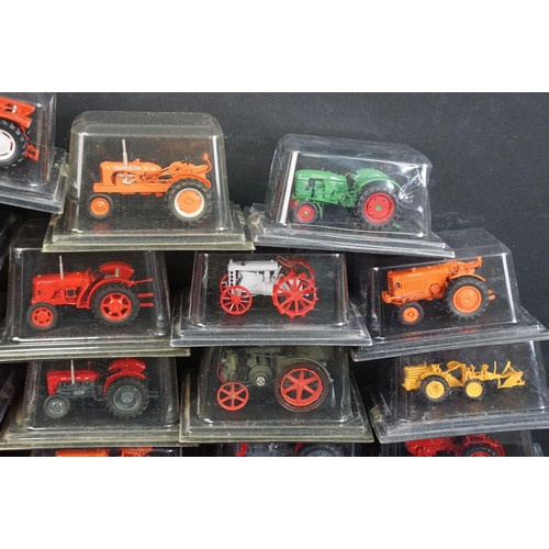106 - 34 Boxed / cased Hatchette diecast model tractors, all variants, ex