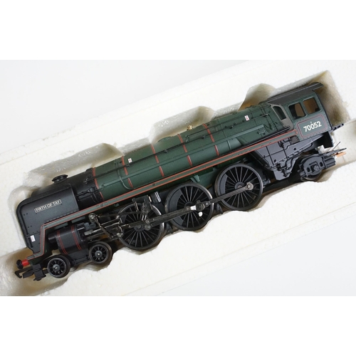 42 - Four boxed OO gauge locomotives to include 3 x Hornby (R2175 BR 4-6-2 Britannia Class 7MT Locomotive... 