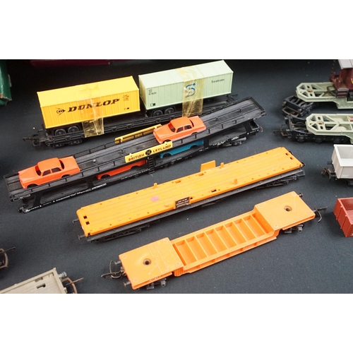 46 - Around 125 OO / HO gauge items of rolling stock to include car transporters, wagons, tankers and tru... 