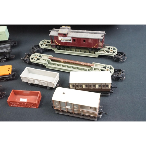 46 - Around 125 OO / HO gauge items of rolling stock to include car transporters, wagons, tankers and tru... 