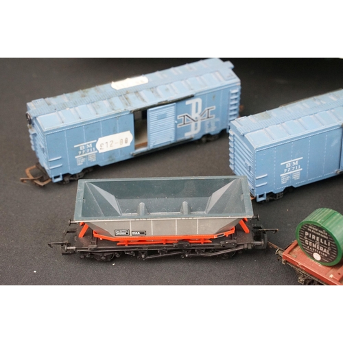 46 - Around 125 OO / HO gauge items of rolling stock to include car transporters, wagons, tankers and tru... 