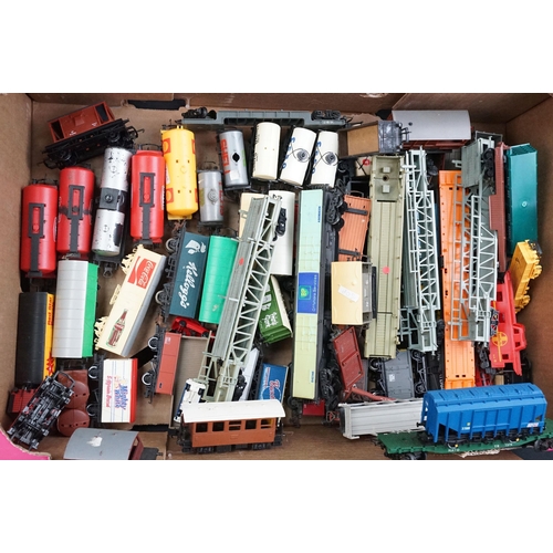 46 - Around 125 OO / HO gauge items of rolling stock to include car transporters, wagons, tankers and tru... 