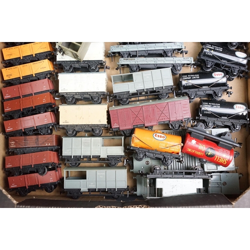 56 - Around 70 Hornby Dublo items of rolling stock to include 7 x boxed examples, plus 2 x footbridges, 3... 