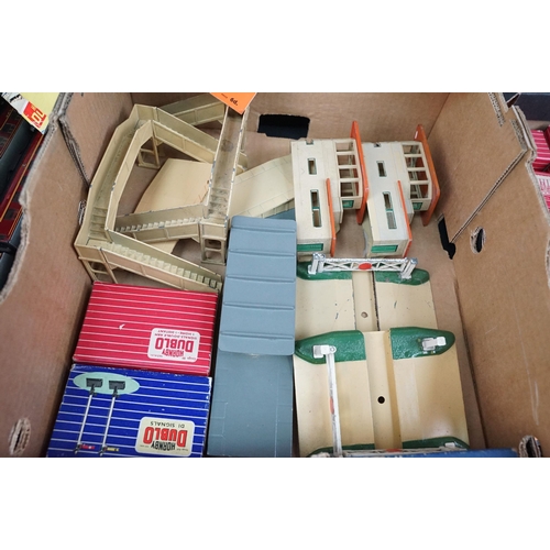 56 - Around 70 Hornby Dublo items of rolling stock to include 7 x boxed examples, plus 2 x footbridges, 3... 