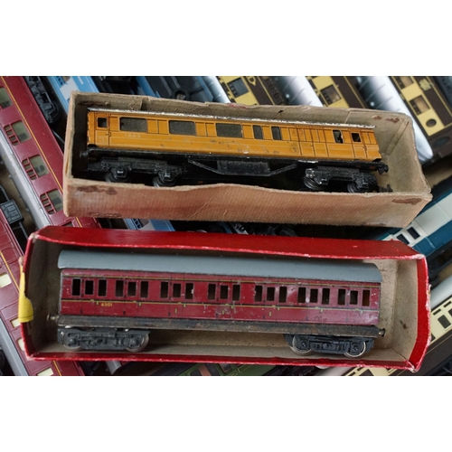 57 - Around 90 OO / HO gauge items of rolling stock featuring coaches, tankers and wagons including Lima,... 