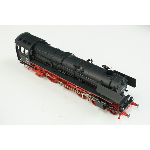 60 - Four OO / HO gauge locomotives to include 2 x 4-6-2 DB in black with tender, Triang R357 D5572 and a... 