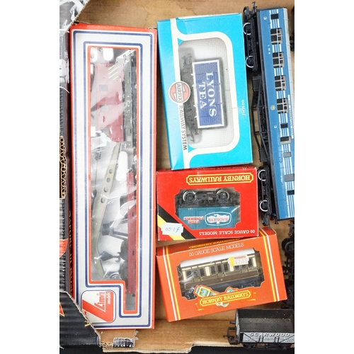 65 - 11 Boxed OO gauge items of rolling stock to include 9 x Hornby, a Lima 309059 Breakdown Crane and Ai... 