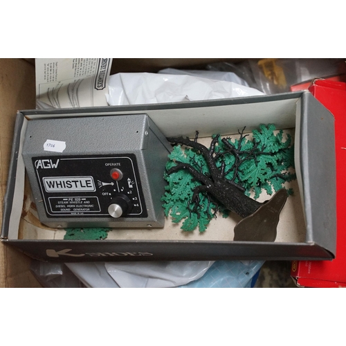 66 - Quantity of OO gauge model railway accessories to include plastic trackside buildings, scenery, vari... 