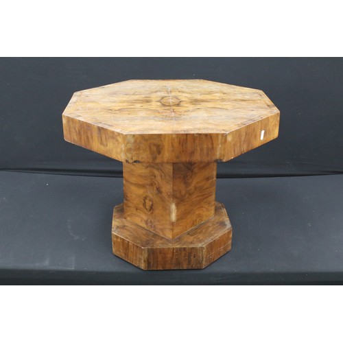 605A - An octagonal Deco coffee table with single pedestal column