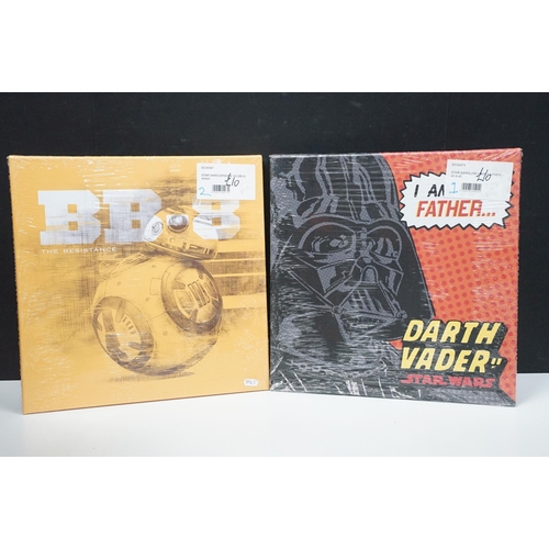 251 - Star Wars - 14 framed canvas Star Wars prints featuring Millennium Falcon Blueprints, Kylo Ren Fire,... 