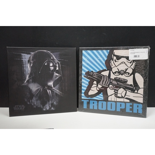 251 - Star Wars - 14 framed canvas Star Wars prints featuring Millennium Falcon Blueprints, Kylo Ren Fire,... 