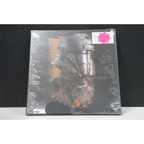 251 - Star Wars - 14 framed canvas Star Wars prints featuring Millennium Falcon Blueprints, Kylo Ren Fire,... 