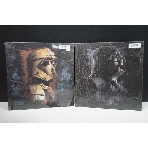 251 - Star Wars - 14 framed canvas Star Wars prints featuring Millennium Falcon Blueprints, Kylo Ren Fire,... 