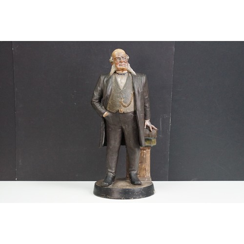 108 - Large statue figurine of a gentleman with pocket watch leaning on column with books, marked DEP BB 4... 