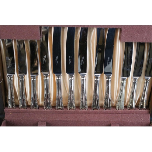 312 - Bestecke Solingen gold plated cutlery set in fitted brief case together with a wooden canteen of sta... 