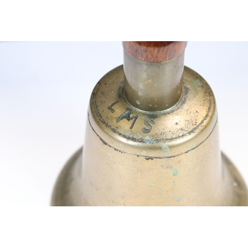 104 - Large vintage school bell with wooden handle marked LMS, H 25cm