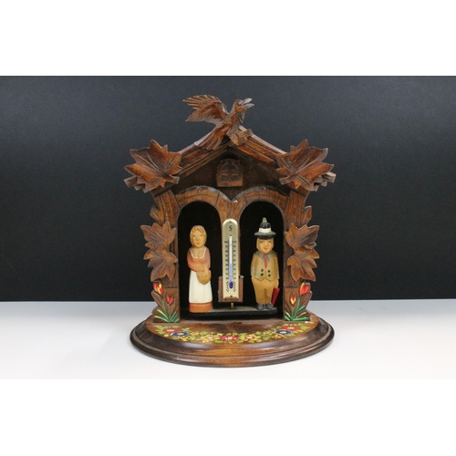 110 - Vintage hand carved Black Forest thermometer with rotating figures, hand painted, H 29cm