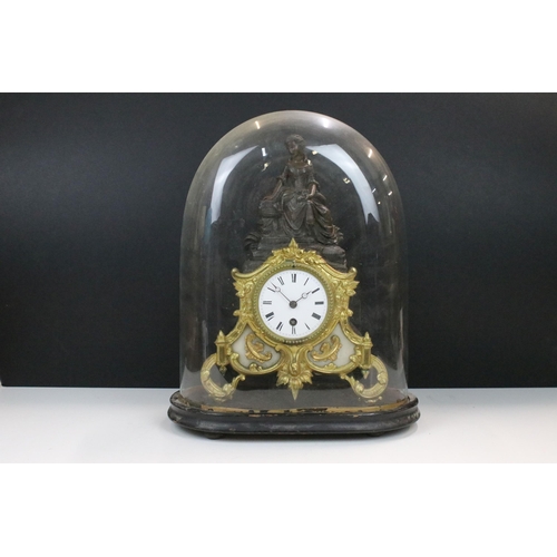 120 - 19th Century cast metal mantle clock with female figure and gil foliate details, the clock having a ... 