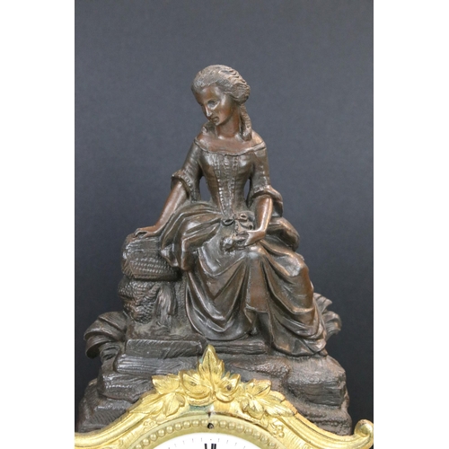 120 - 19th Century cast metal mantle clock with female figure and gil foliate details, the clock having a ... 