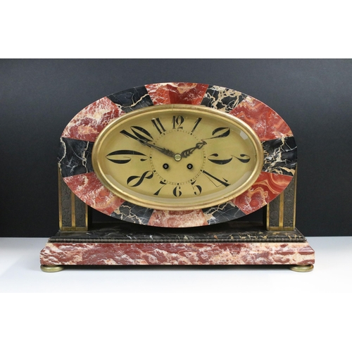 93 - Edwardian marble oval clock with a pair of matching garnitures