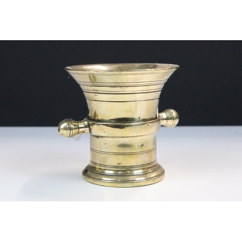 98 - Pair of brass pestle and mortars, largest diameter 14cm