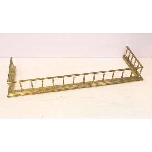 608 - Brass barley twist detail fender fire surround, H 19cm, W 145cm, D 46cm