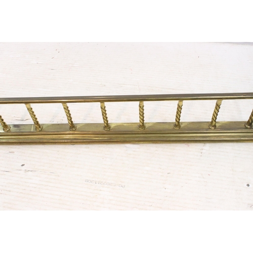 608 - Brass barley twist detail fender fire surround, H 19cm, W 145cm, D 46cm