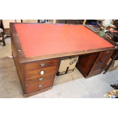 611 - 20th Century mahogany partners twin pedestal desk having a red leather top, with each pedestal havin... 